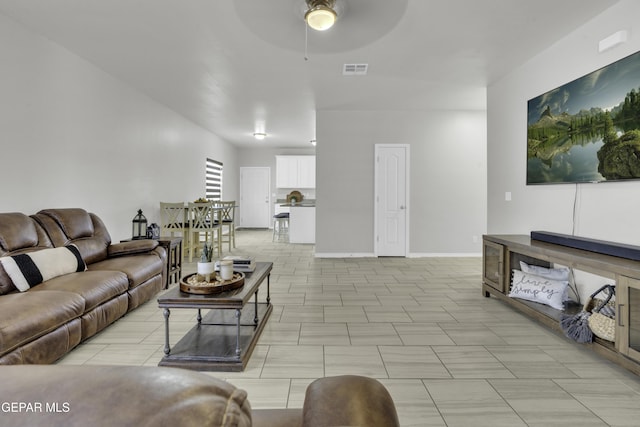 living room with ceiling fan