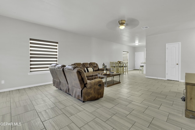 living room with ceiling fan