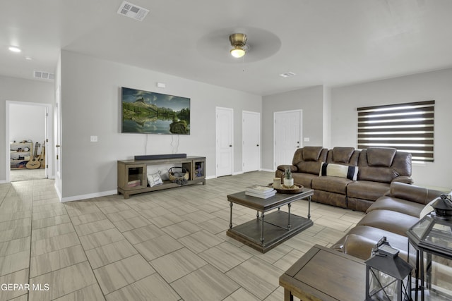 living room featuring ceiling fan