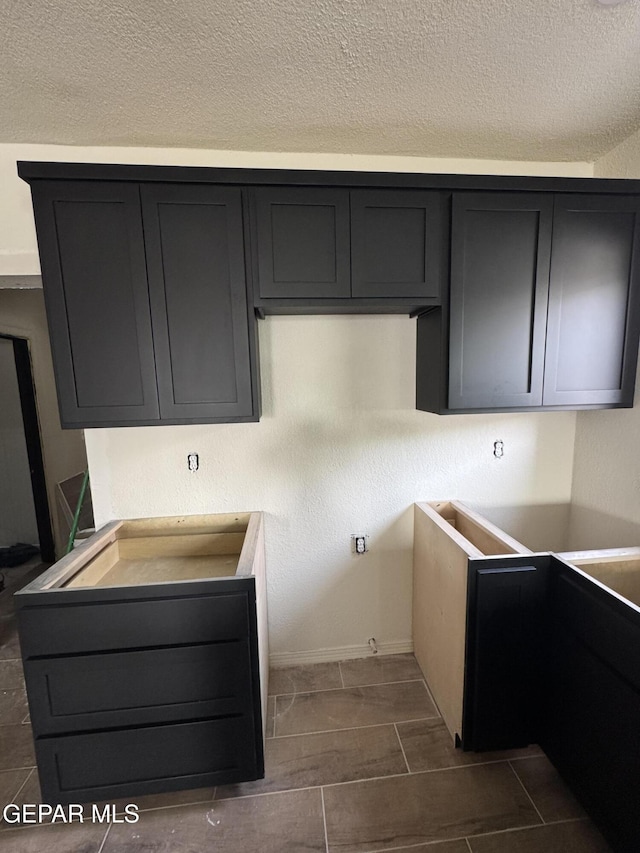 kitchen featuring a textured ceiling