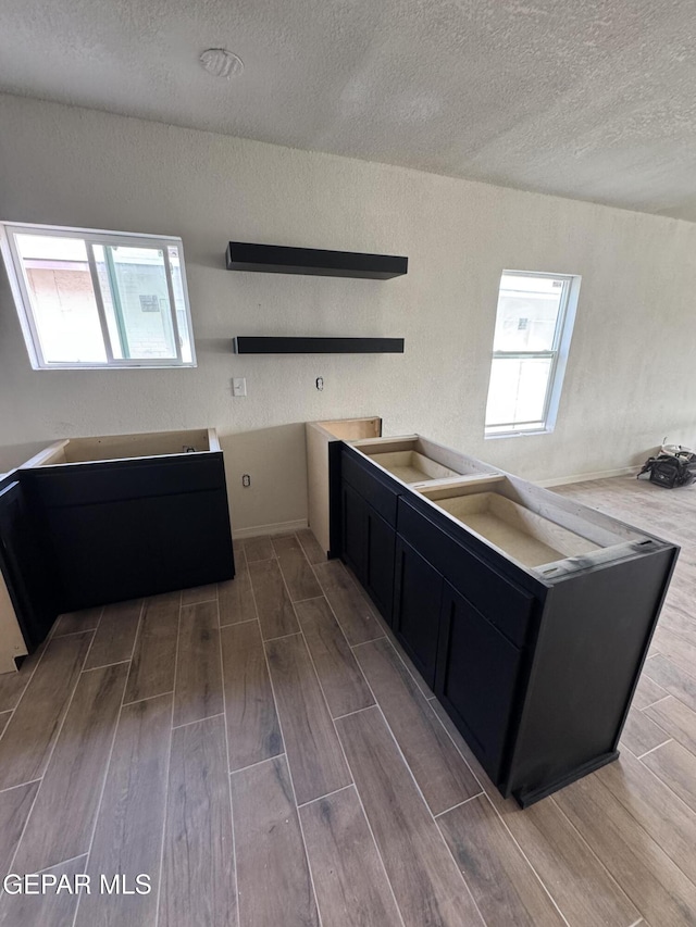 kitchen featuring a textured ceiling