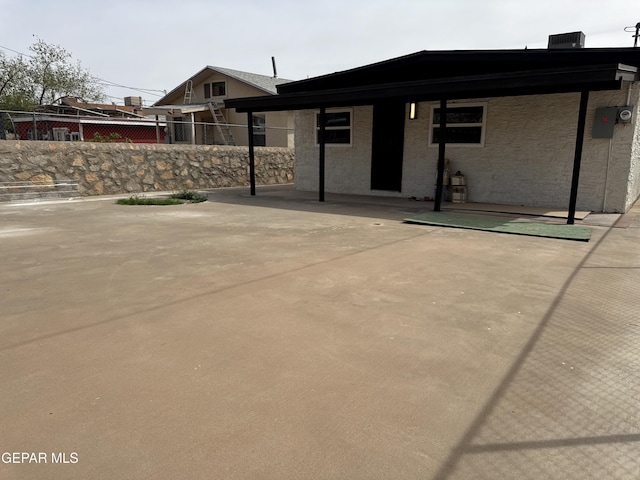 back of property with fence