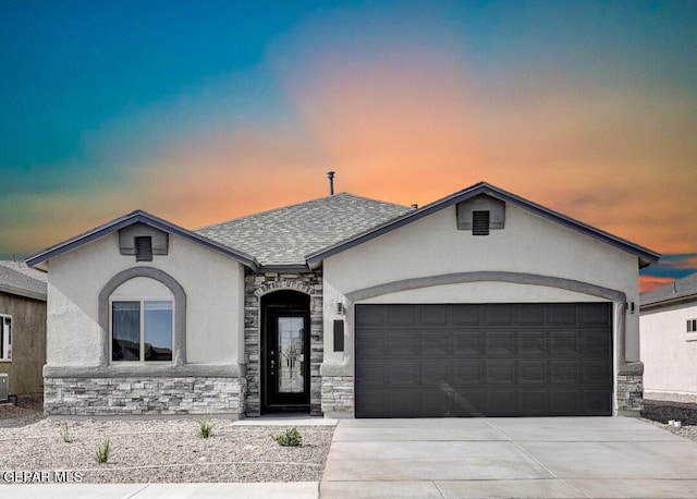 view of front of home featuring a garage