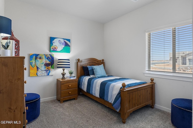 bedroom with light colored carpet