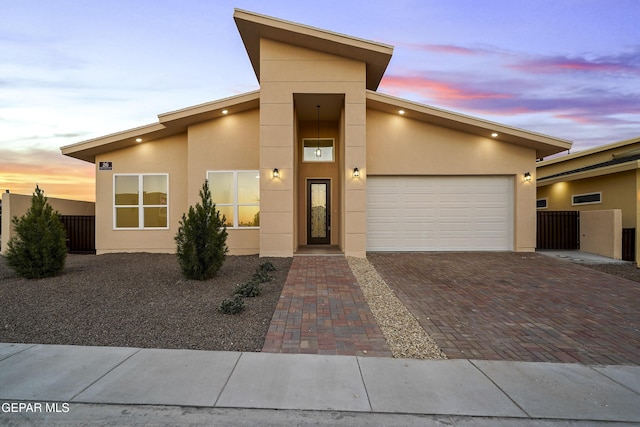 modern home featuring a garage