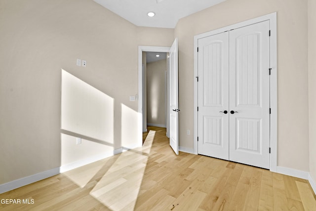 hall featuring light wood-type flooring