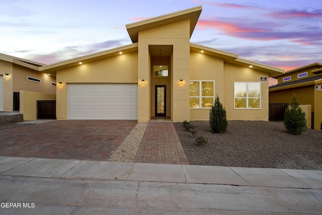 contemporary home featuring a garage