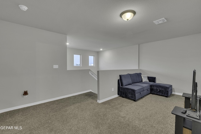 living area with carpet flooring