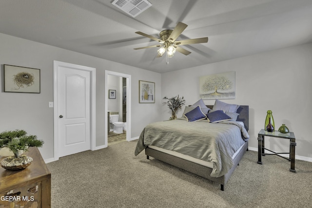 bedroom with ensuite bathroom, ceiling fan, and carpet