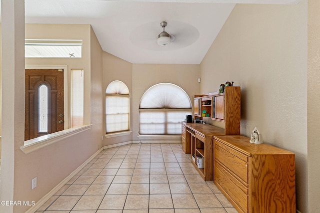 interior space with vaulted ceiling and ceiling fan