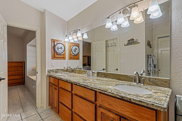 bathroom featuring tile patterned floors and vanity