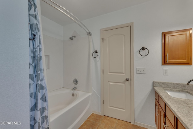 bathroom with tile patterned flooring, vanity, and shower / bath combo with shower curtain