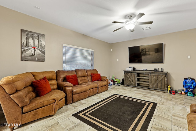 living room featuring ceiling fan