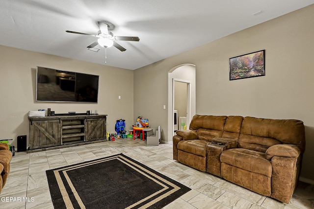 living room featuring ceiling fan