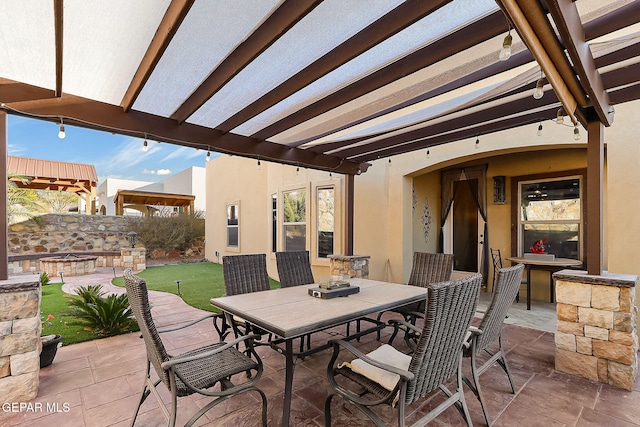 view of patio featuring a pergola