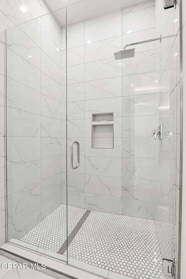 bathroom featuring walk in shower