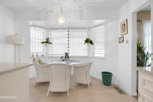 dining space featuring a wealth of natural light