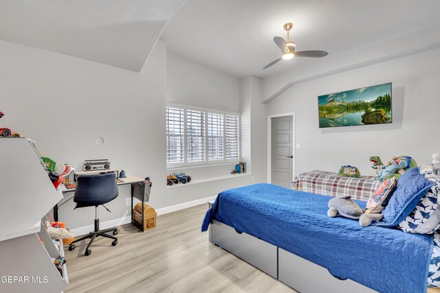 bedroom with ceiling fan and light wood-type flooring