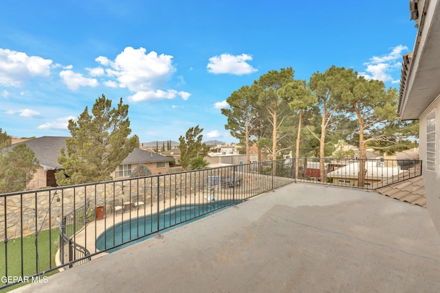 view of pool featuring a patio