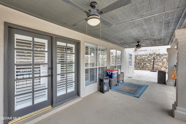 view of patio with ceiling fan