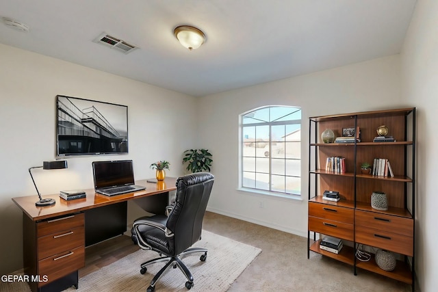 office area with light colored carpet