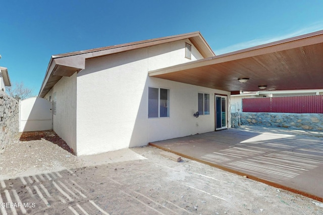 rear view of property featuring a patio area