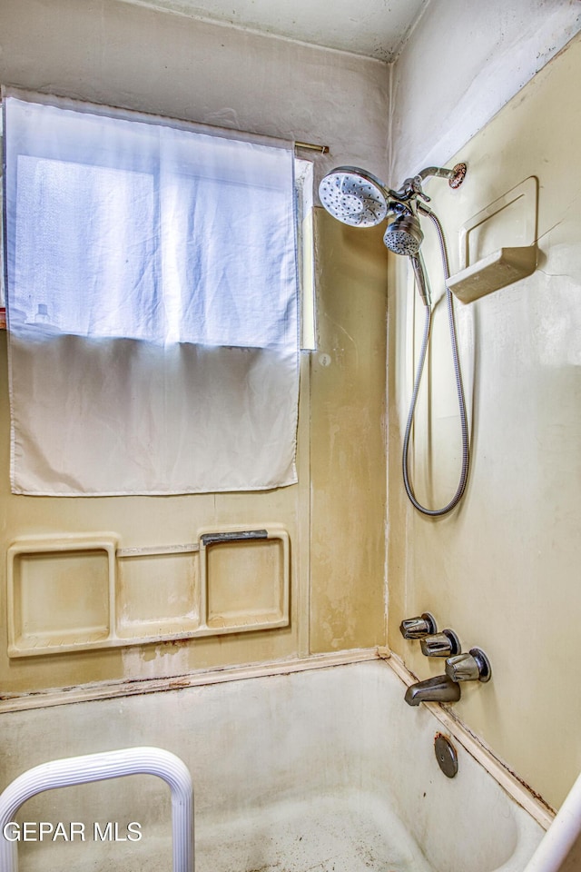 bathroom with shower / bathing tub combination