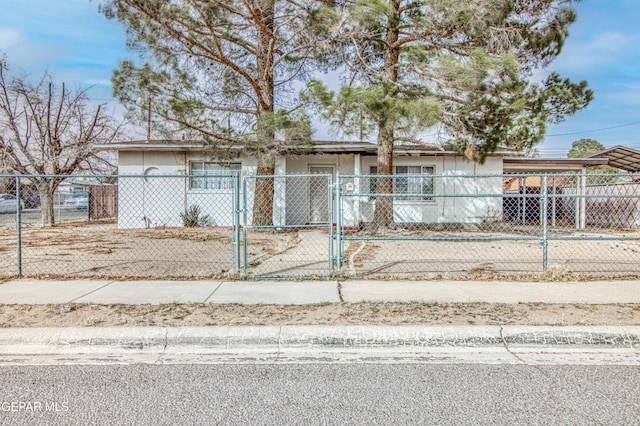 view of front facade with a carport