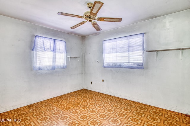 spare room featuring ceiling fan