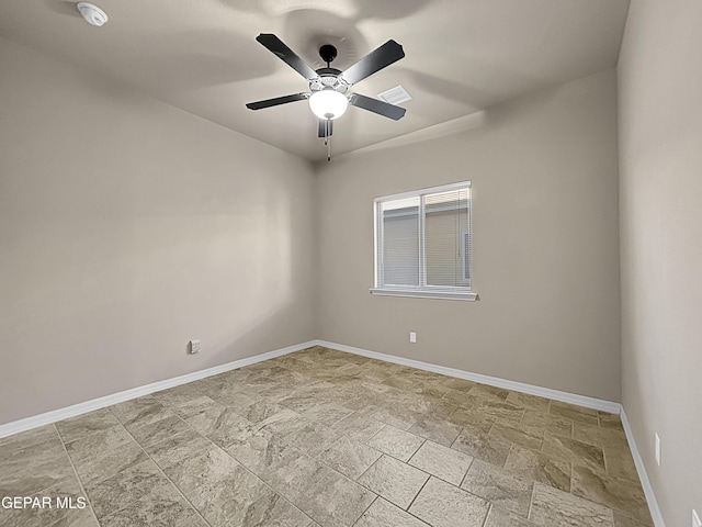 unfurnished room with ceiling fan