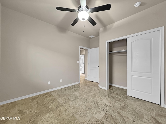 unfurnished bedroom with a closet and ceiling fan