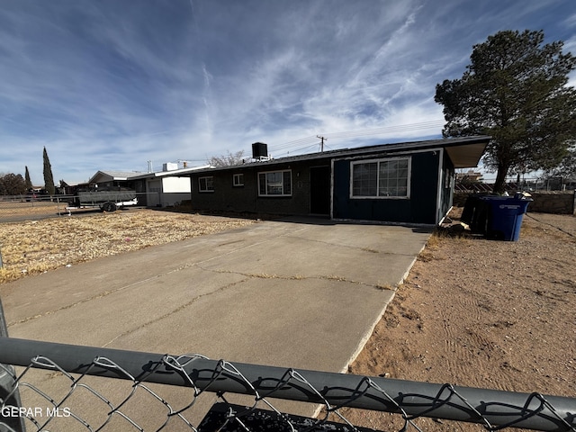 view of front of property with central AC unit