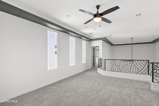 carpeted empty room with ceiling fan