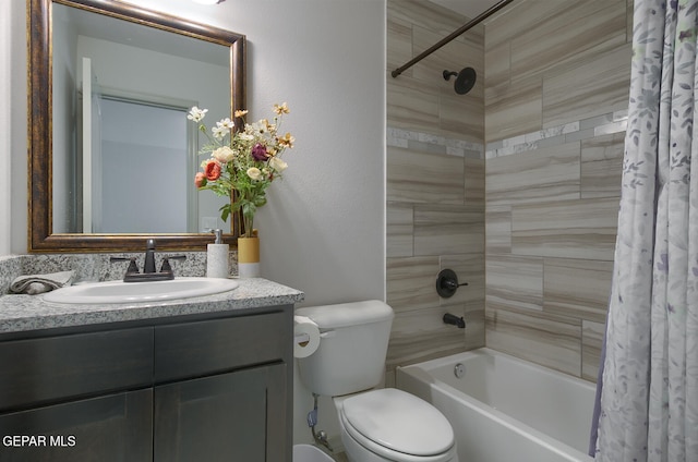 full bathroom with shower / tub combo, vanity, and toilet