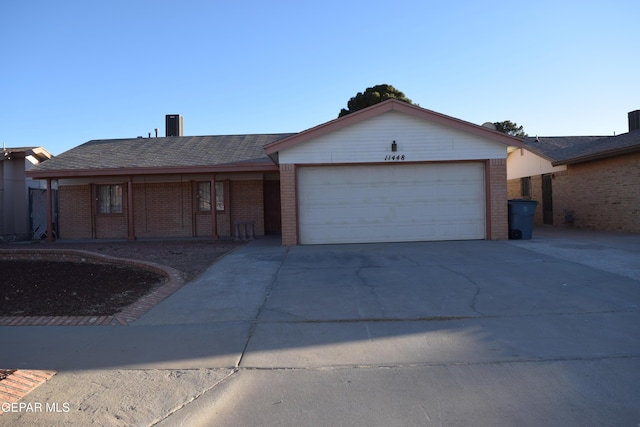 ranch-style home with a garage