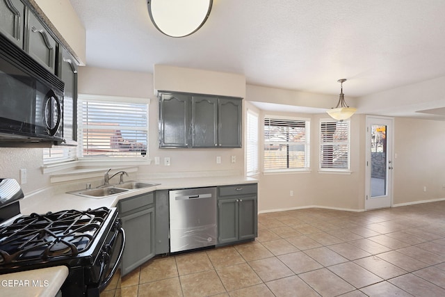 kitchen featuring sink, hanging light fixtures, light tile patterned floors, gray cabinets, and black appliances