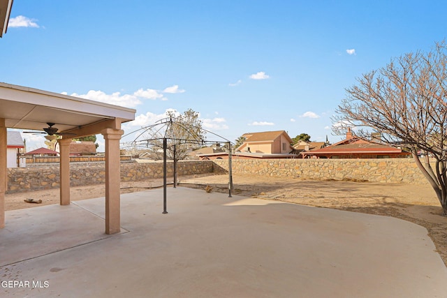 view of patio with ceiling fan