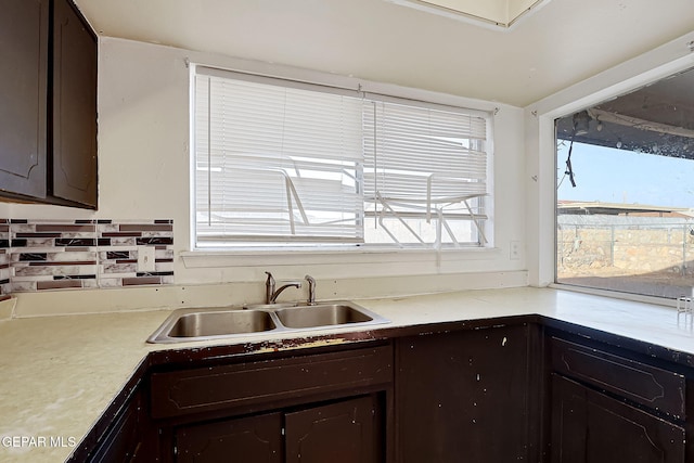 kitchen with sink and dark brown cabinets