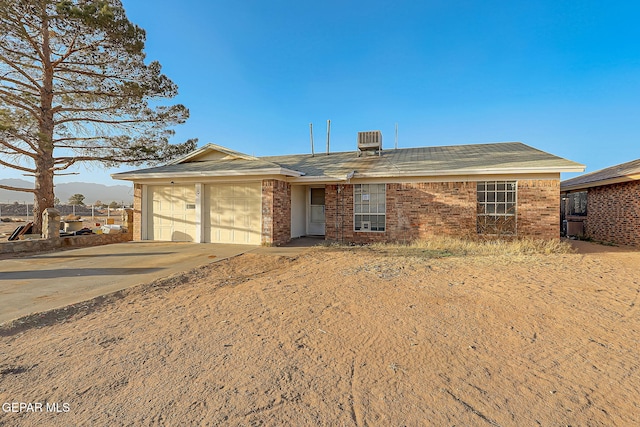 ranch-style home with a garage