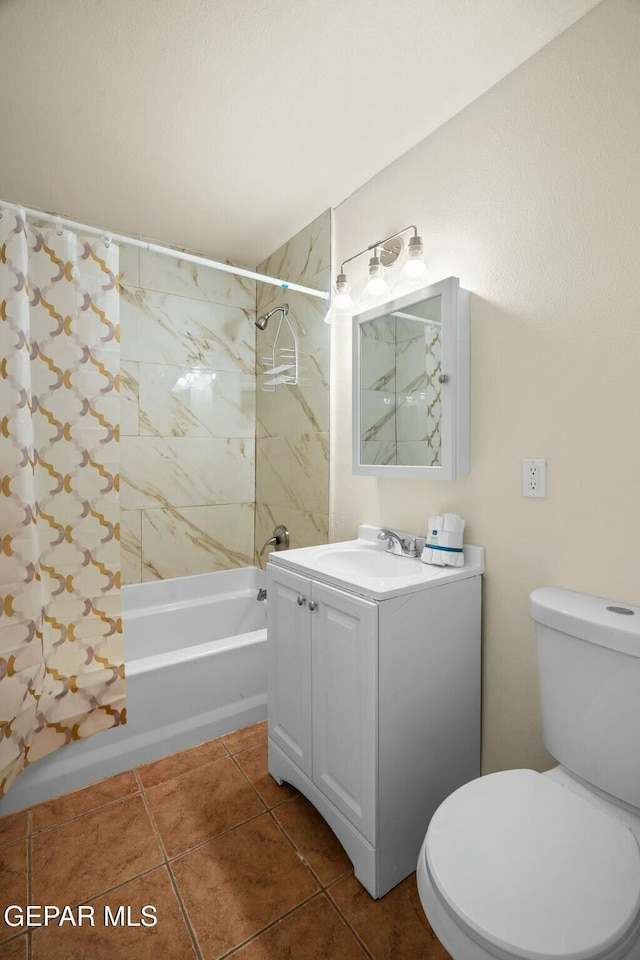 full bathroom with vanity, tile patterned floors, toilet, and shower / bath combo