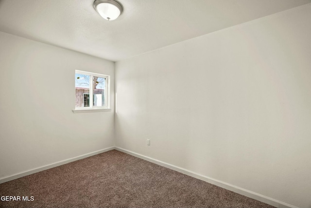 spare room with carpet floors