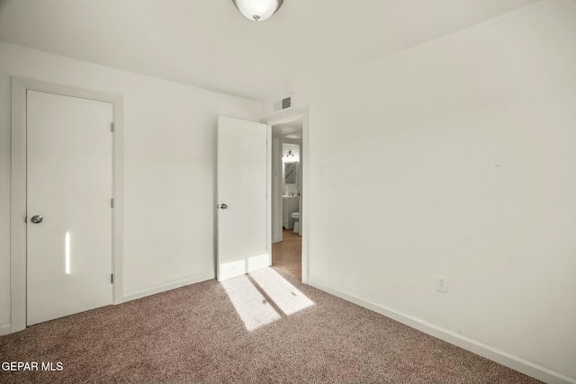 unfurnished bedroom featuring carpet floors