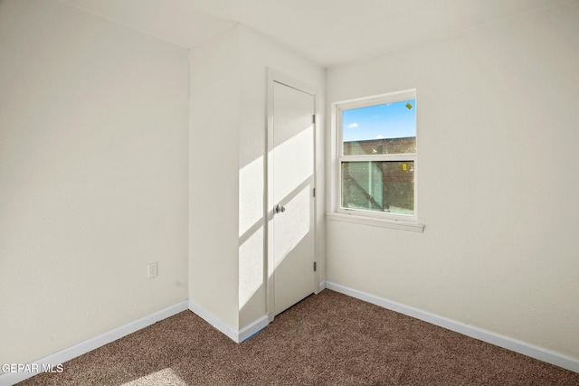 view of carpeted spare room