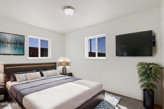 241 Mango Rd, El Paso, TX 79915 - carpeted bedroom with baseboards