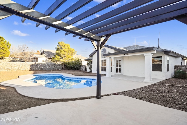 view of swimming pool featuring a pergola and a patio