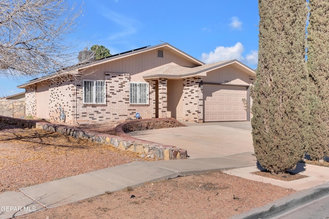 ranch-style home with a garage