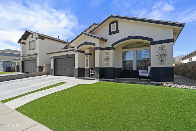 view of front of house with a garage and a front lawn