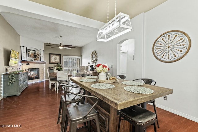 dining room featuring dark hardwood / wood-style floors and ceiling fan