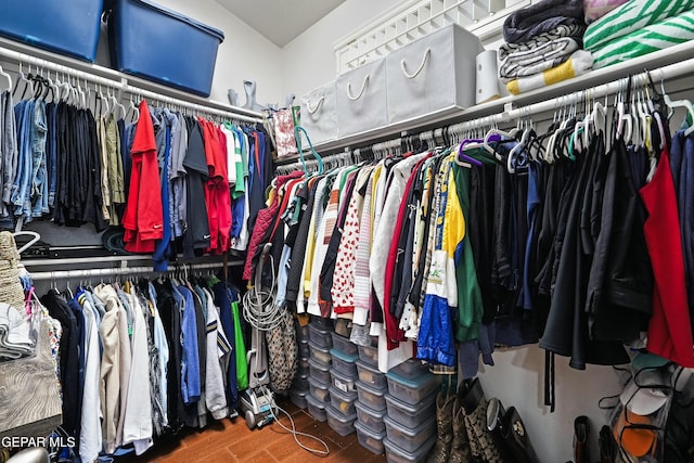 walk in closet featuring hardwood / wood-style floors