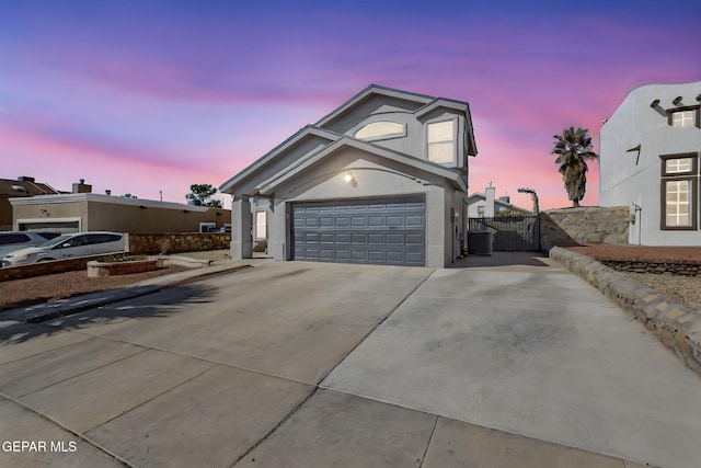 front of property with a garage